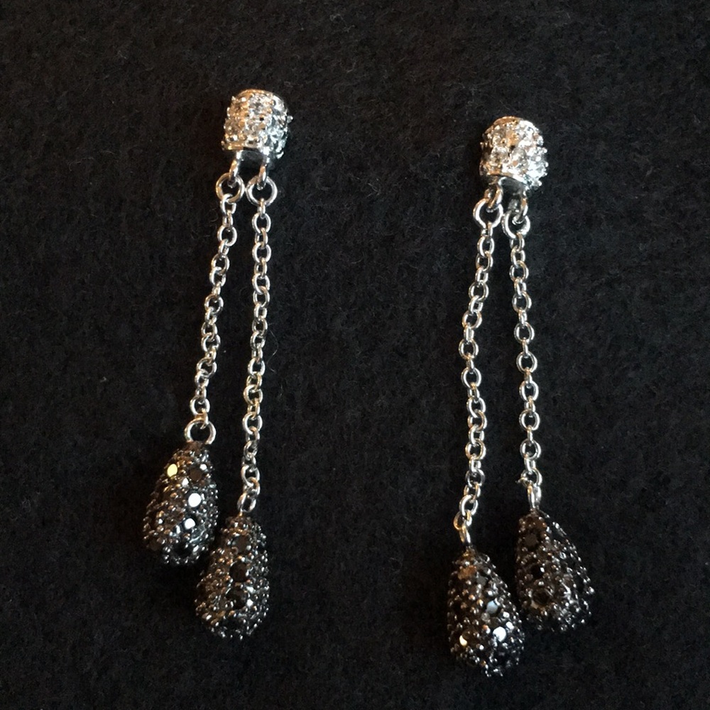 Silver tone earrings with pave ball drop